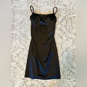 Plain Black mini dress, size medium, from originality. Has been worn out twice